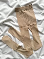 جوراب شلواری شیشه ای کرم