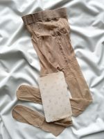 جوراب شلواری شیشه ای طرح برند